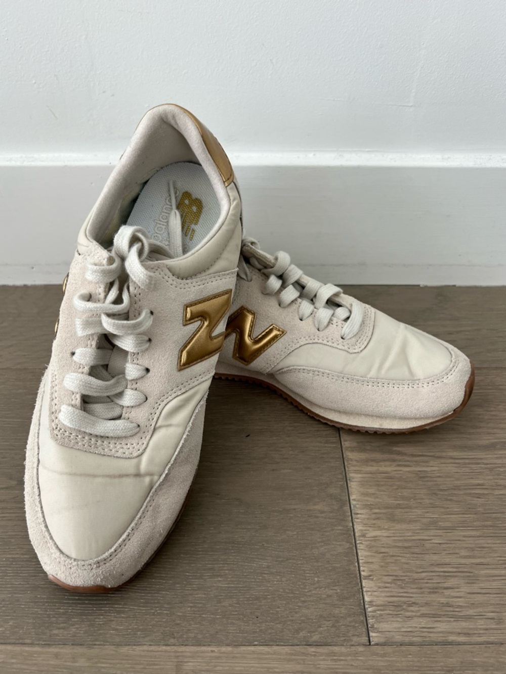 New Balance Women's Sneakers in Cream with Gold N Logo